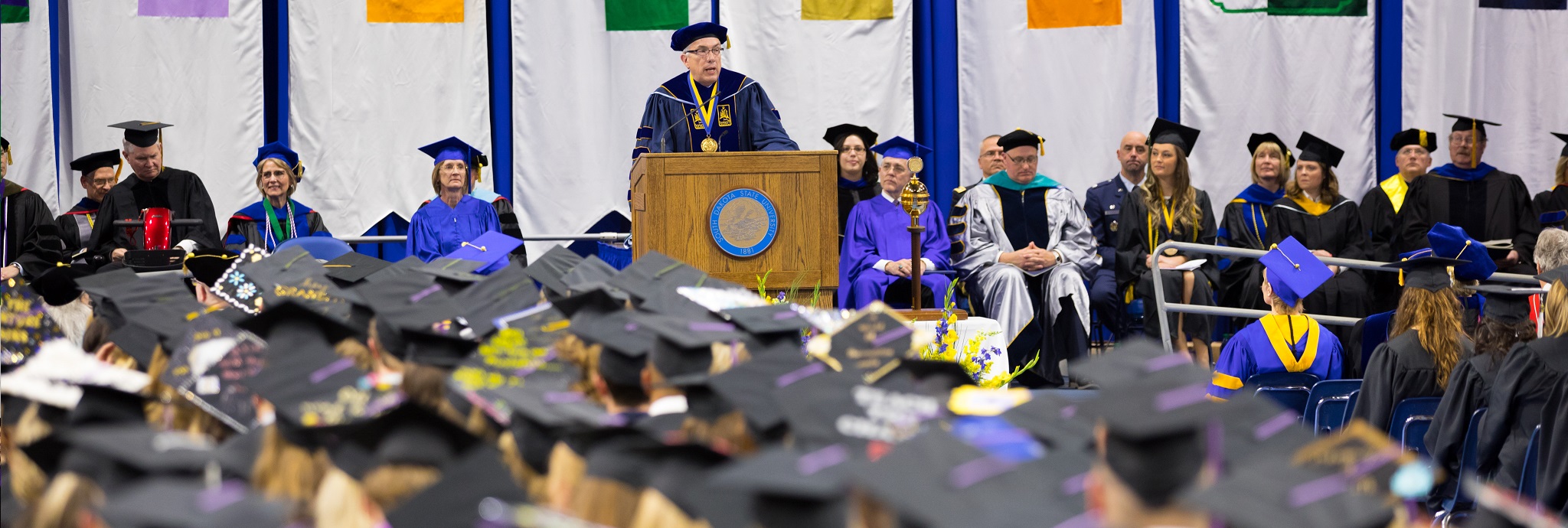 President Dunn speaking at SDSU graduation ceremony.